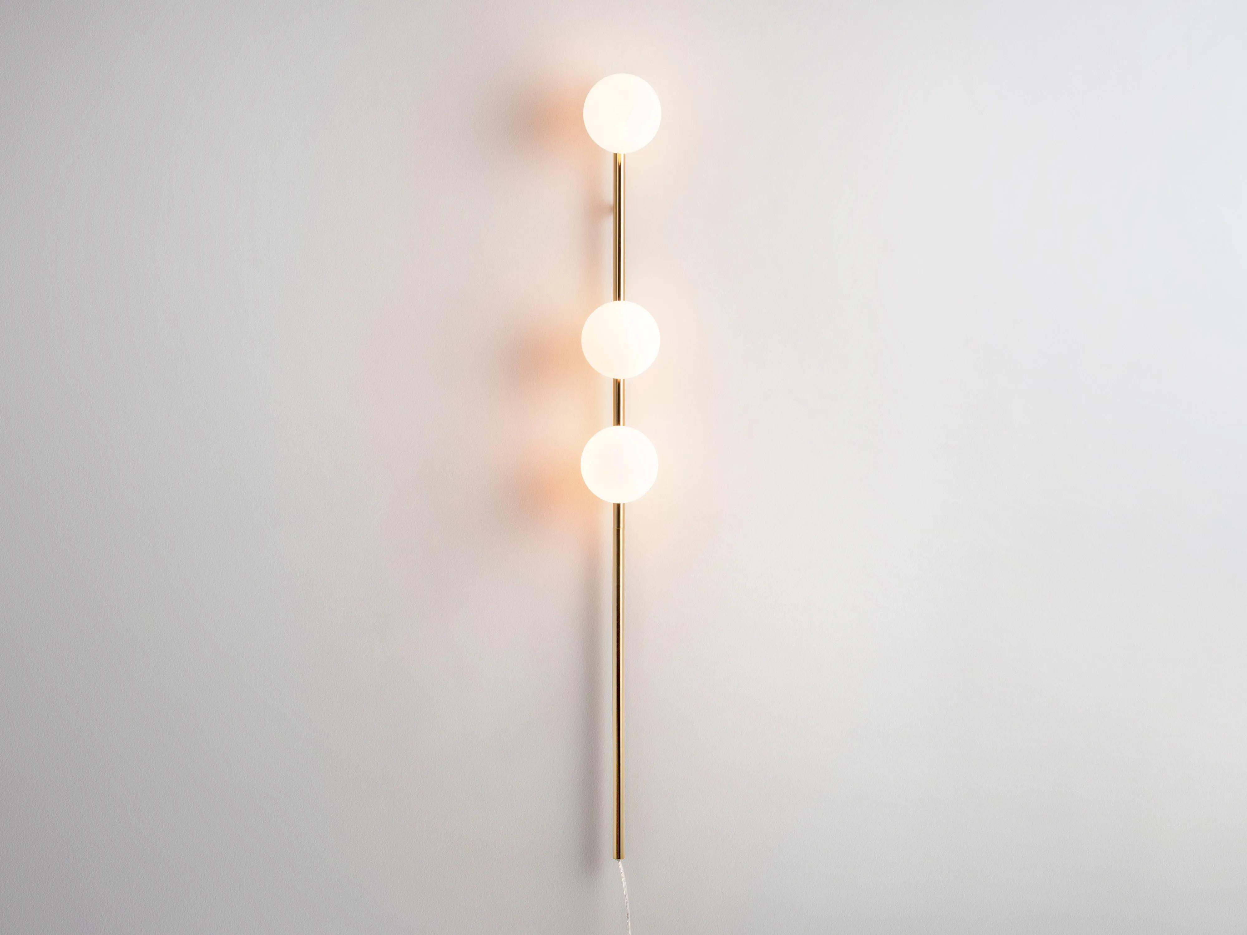 Brass bar opal ball wall light